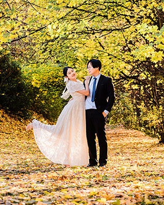 Engagement in golden Autumn in Arrowtown, Otago